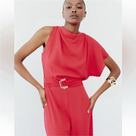 ASYMMETRIC CREPE BUCKLE JUMPSUIT
RED / CORAL . SIZE M, L - Picture 6 of 16